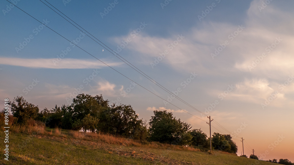 Strommasten im Sonnenuntergang