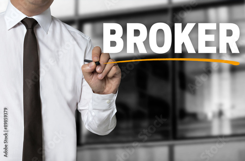 Φωτογραφία broker is written by businessman background concept