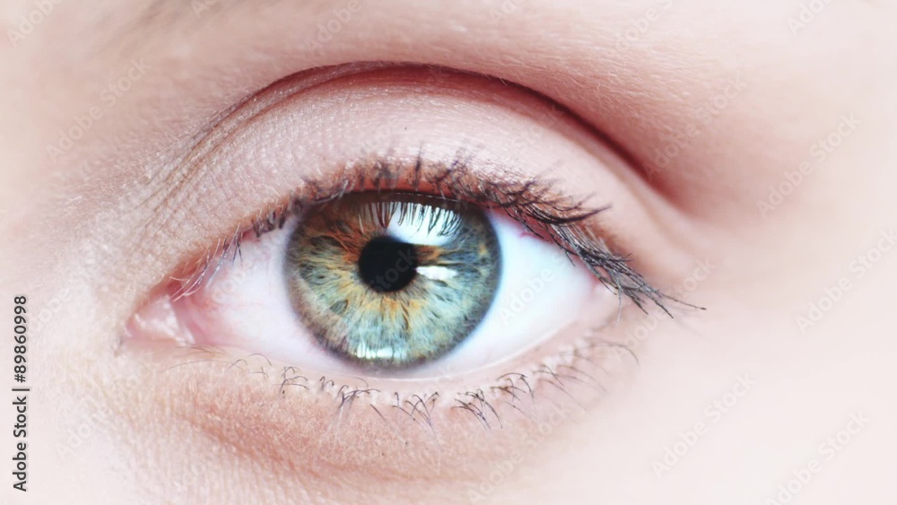 Macro Close-up eye blinking. Slow Motion, 120 fps, Zoom. Young Woman is opening and closing her beautiful eye. Macro Close-up eye blinking. Slow Motion, 120 fps, Zoom. Young Woman is opening and closing her beautiful eye.