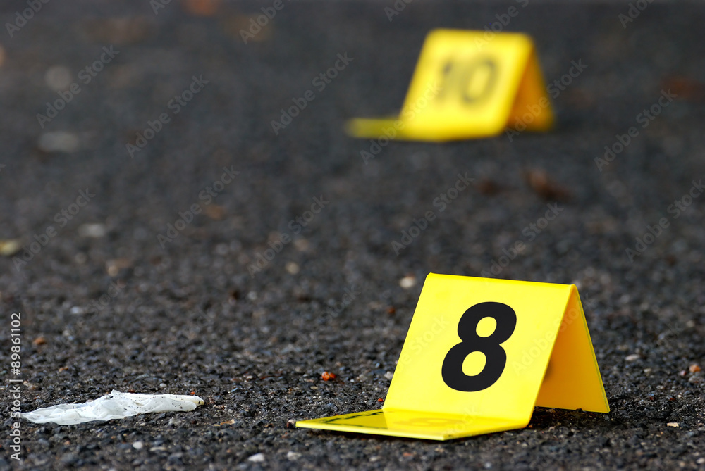 Crime Evidence Markers on Asphalt Crime Evidence Markers on Asphalt