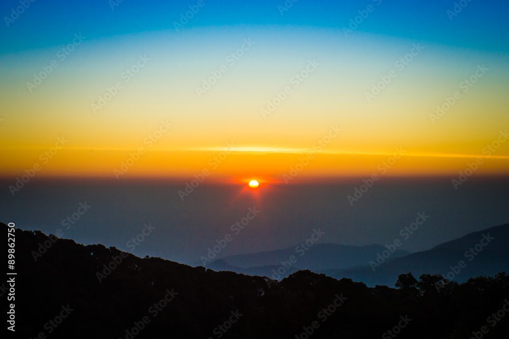 Fototapeta premium Sunrise over the Mountains at Kew Mae Pan in the morning, Chiang
