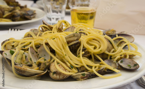 Italian food. Delicious spaghetti with clams .