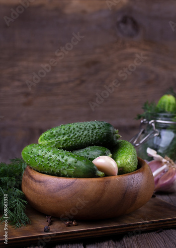 fresh cucumbers on wooden table