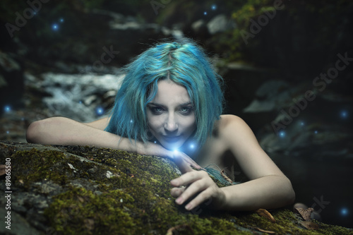 Photos Dark dryad playing with forest spirits