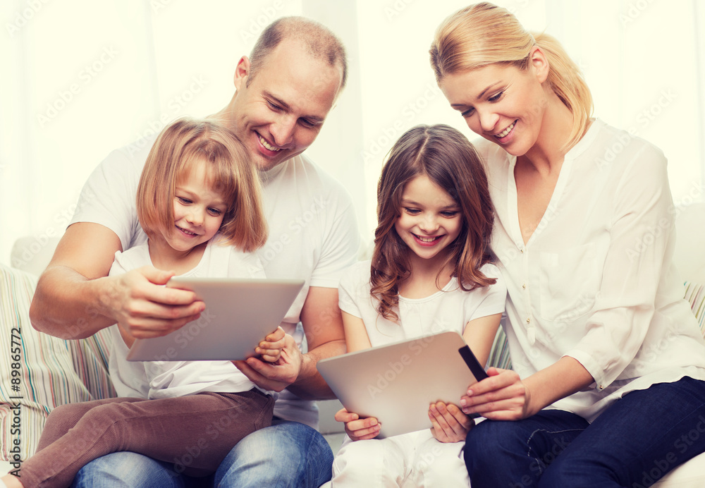 family and two kids with tablet pc computers family and two kids with tablet pc computers
