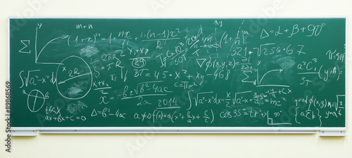 math formulas on green chalkboard