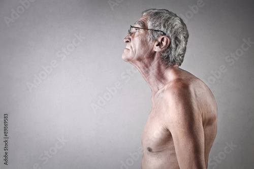 Hunchbacked elderly man