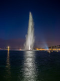 Dramatic night view of the Geneva water jet