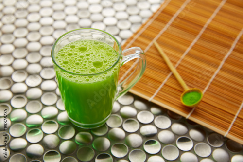 Matcha green tea from Japan on stainless steel photo