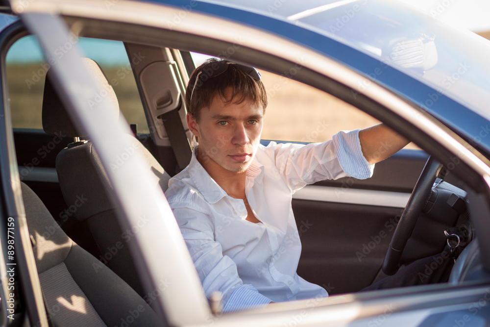 Man thinking about something in the car Man thinking about something in the car