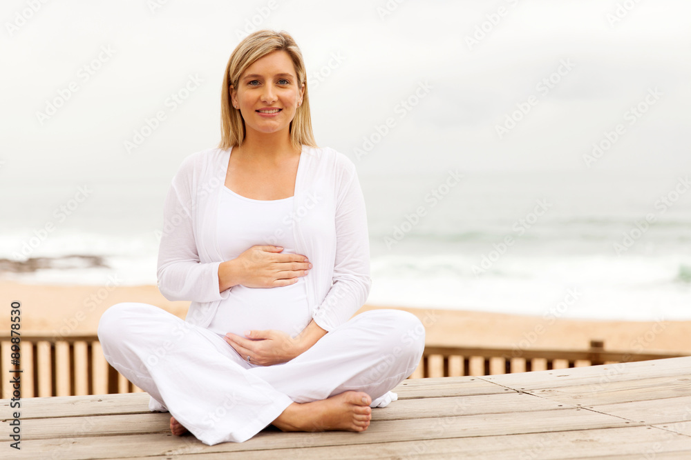 young pregnant woman outdoors