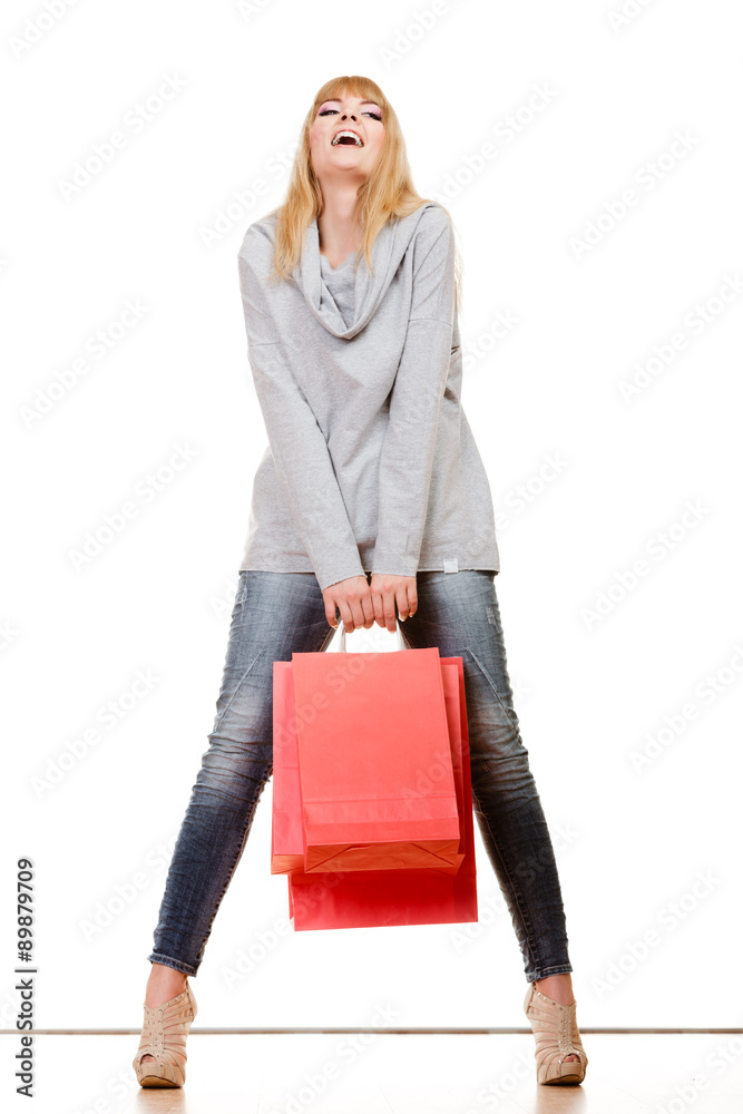 girl in full length with red shopping bags isolated girl in full length with red shopping bags isolated