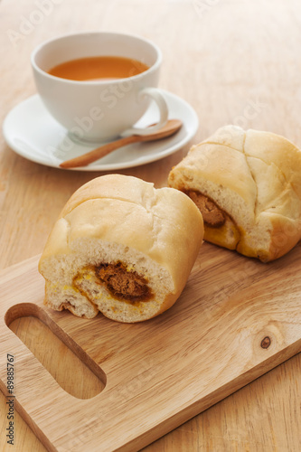 Bread cut sweet with hot milk tea