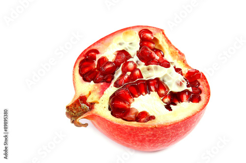 Fresh pomegranate on white background.