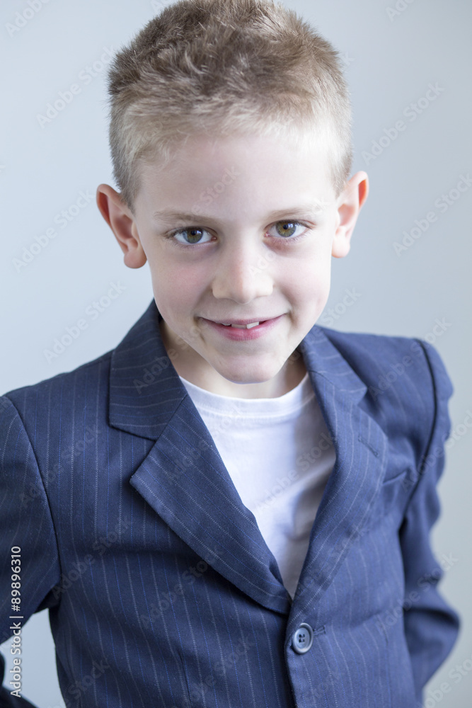 Young boy wearing a suit Young boy wearing a suit