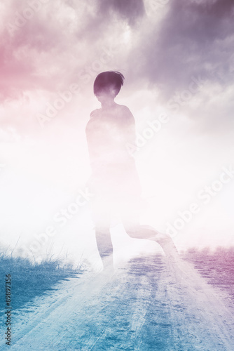 Woman Running to Freedom Through Countryside Field