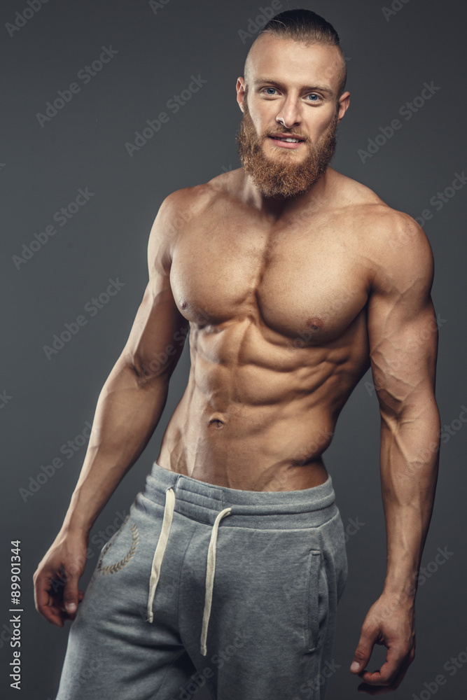 Shirtless muscular guy with beard
