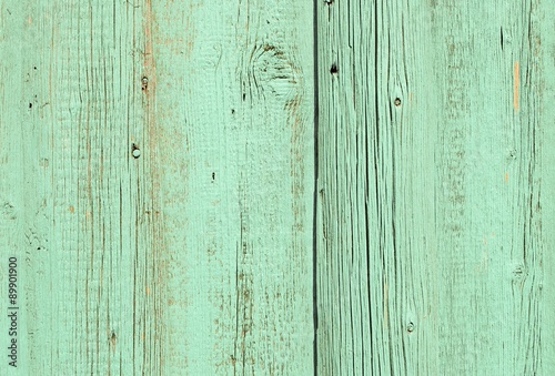 Turquoise painted old wooden wall