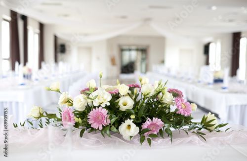 Wedding table with bouquet of gerbera flowers
