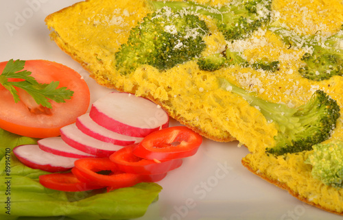 Delicious omelet with vegetables on plate