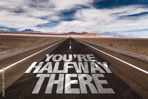You're Halfway There written on desert road