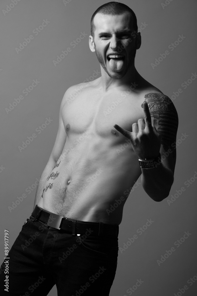 Obraz premium Bodybuilding, body sculpture concept. Male model with perfect body