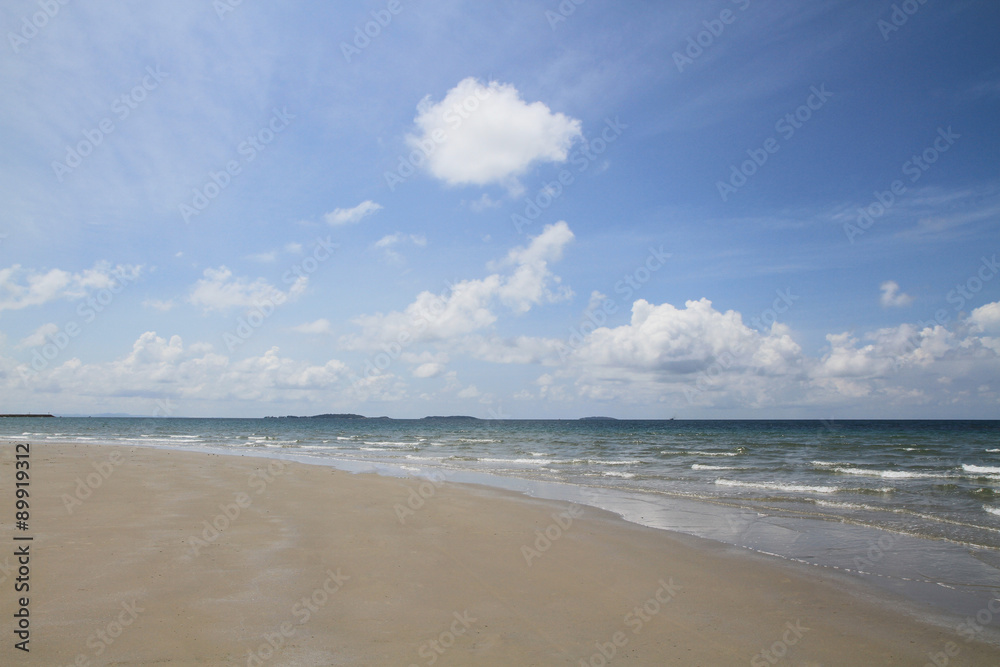 Beach and tropical sea with blue sky and cloud
