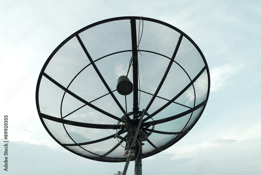 Satellite dish with blue sky background