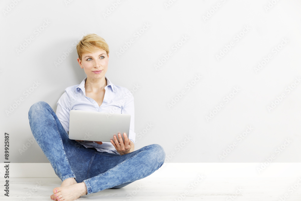 Woman using her laptop computer