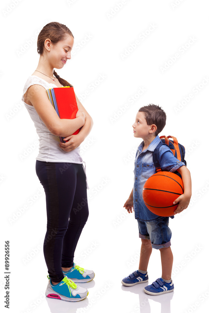 School kids standing on white background School kids standing on white background