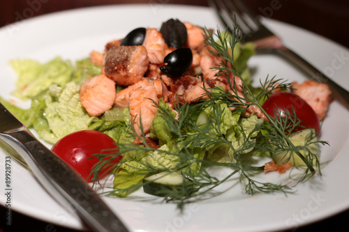 salad in a restaurant with fish