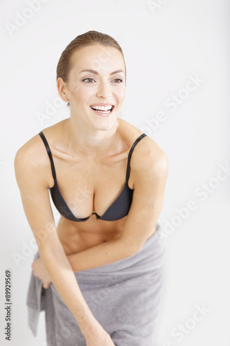 Woman with towel drapped around her