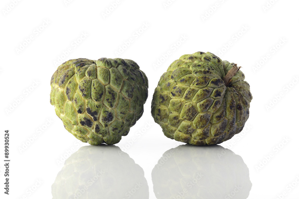 Two Ripened Custard Apples on white Background shot in Studio. Two Ripened Custard Apples on white Background shot in Studio.