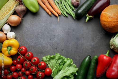 fresh farm vegetables on grey desk