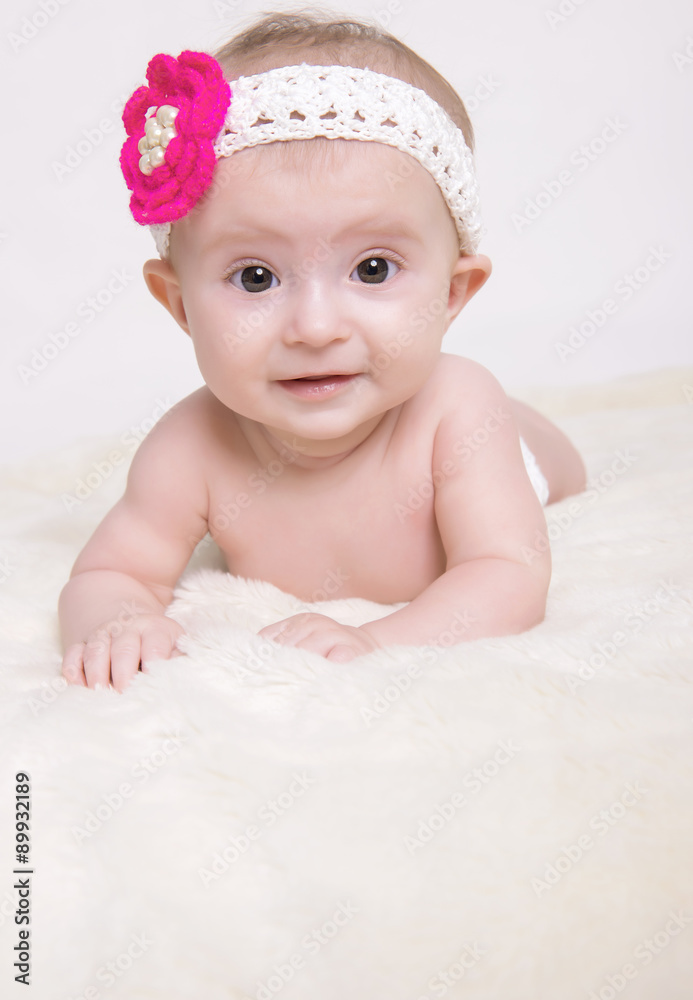 baby lying on blanket and smiling baby lying on blanket and smiling