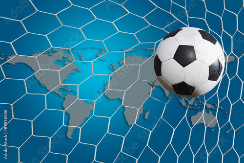 Soccer ball with world map background © FAMILY STOCK