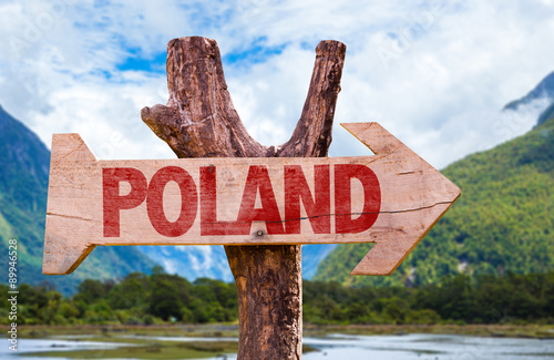 Poland wooden sign with landscape background