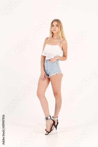 blonde girl in jeans shorts © pbogdanov