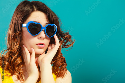 Girl in blue sunglasses portrait