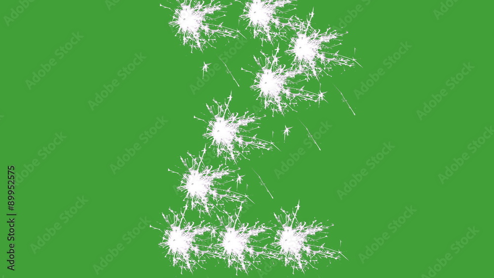 Number 2 in white sparklers on green screen. Number 2 in white sparklers on green screen.