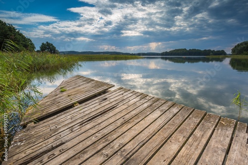 Fototapeta Naklejka Na Ścianę i Meble -  Beautiful lake with old destroyed jetty