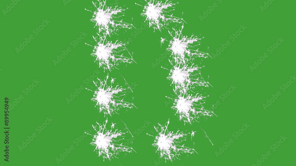 Capital letter D spelled with white sparklers on green screen. Capital letter D spelled with white sparklers on green screen.