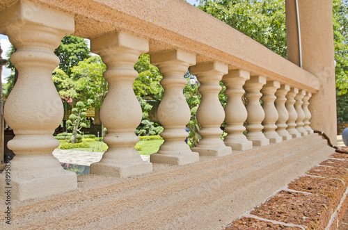 Fotografija The depth of field of balustrade with beige sandstone Columns.