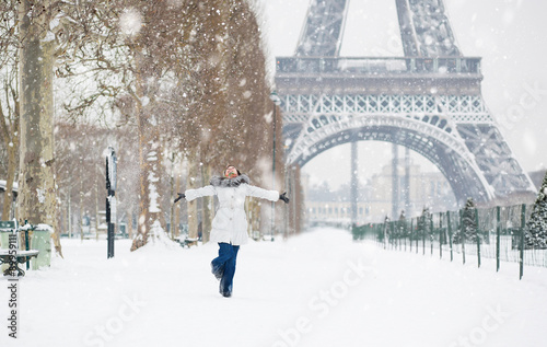 Winter in Paris. Happy young girl jumping © Ekaterina Pokrovsky