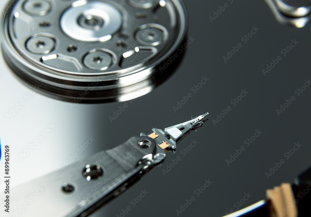 Close up of open computer hard disk drive HDD Close up of open computer hard disk drive HDD