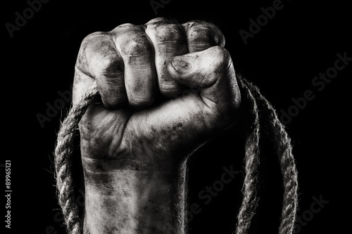 Bild auf Leinwand Rope in male hand. Danger
