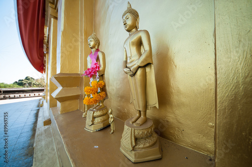 Buddha on Chedi Buddhakhaya, built to mimic the Mahabodhi stupa of Bodhgaya in India, a symbol of Sangklaburi, Kanchanaburi, Thailand photo