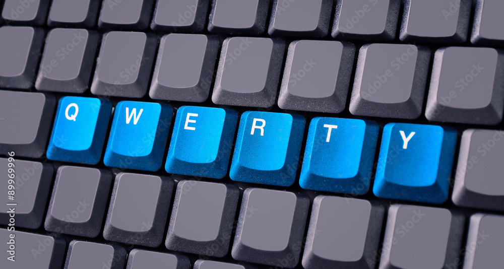 Blue qwerty button on keyboard