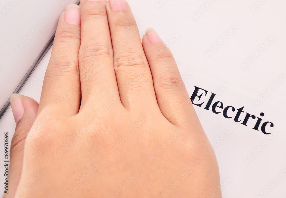 hand with an electric posts hand with an electric posts