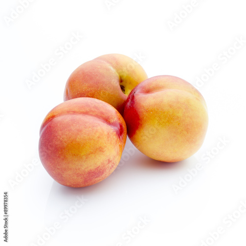 Peach on the white isolatd background.